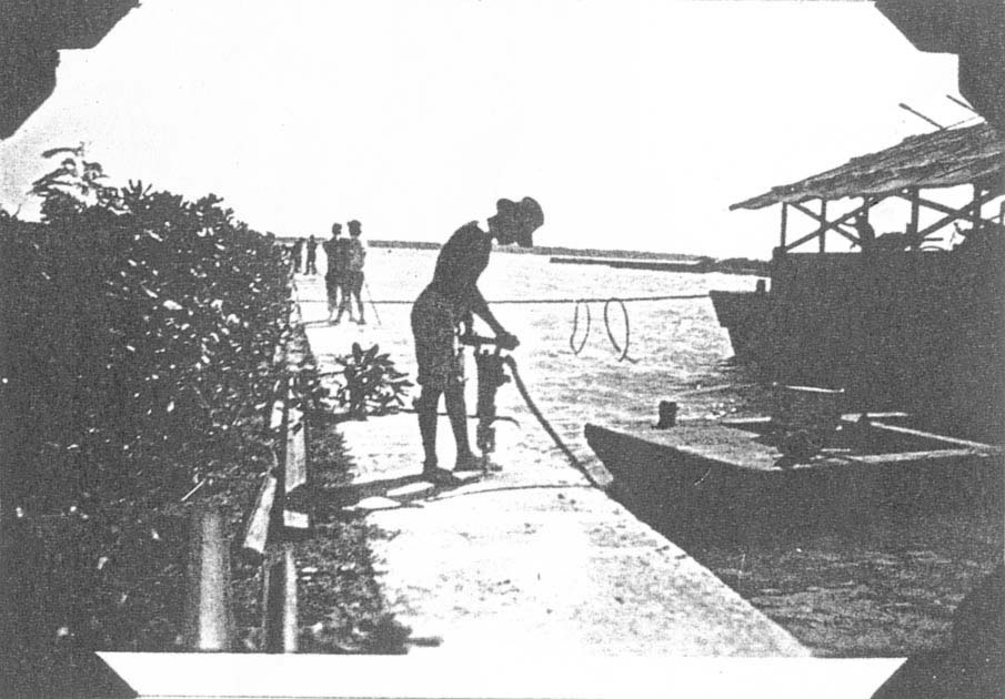 Pan Am Base in Guam: installing protective rails for the Guam slip, 1935