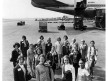 A Pan Am crew poses in front of a Boeing 747 SP